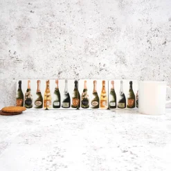 Corinne Alexander Champagne Coaster Set by- Coasters